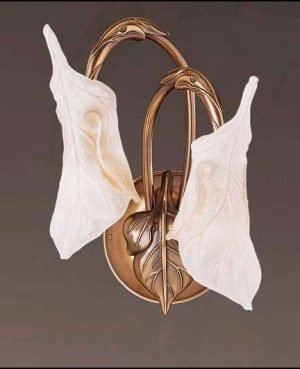 The Riperlamp Ninfa Wall Light features a traditional design with two floral-inspired lampholders and bronze metal base complete with leaf motif.