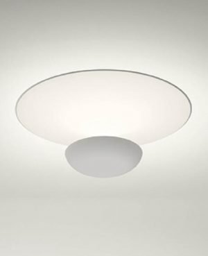 The Vibia Funnel in a glossy white finish provides soft ambient lighting.
